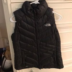 Women’s black north face zip-up vest size M